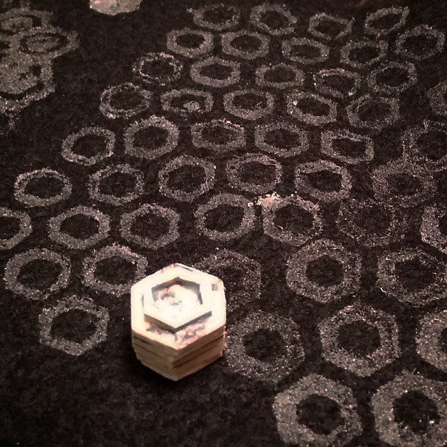 Built_a_tiny_stamp_instead_of_panicking_trying_to_get_access_to_a_laser_cutter_to_cut_a_stencil._Works_great._Needed_revision__though._Pattern_in_the_centre_is_final.__Tron__make__Halloween__cosplay