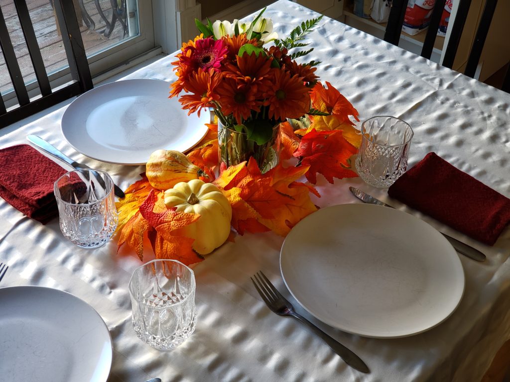 Thanksgiving table setting for three